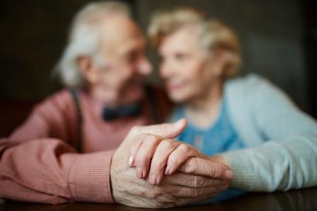 Senior Couple Holding Hands